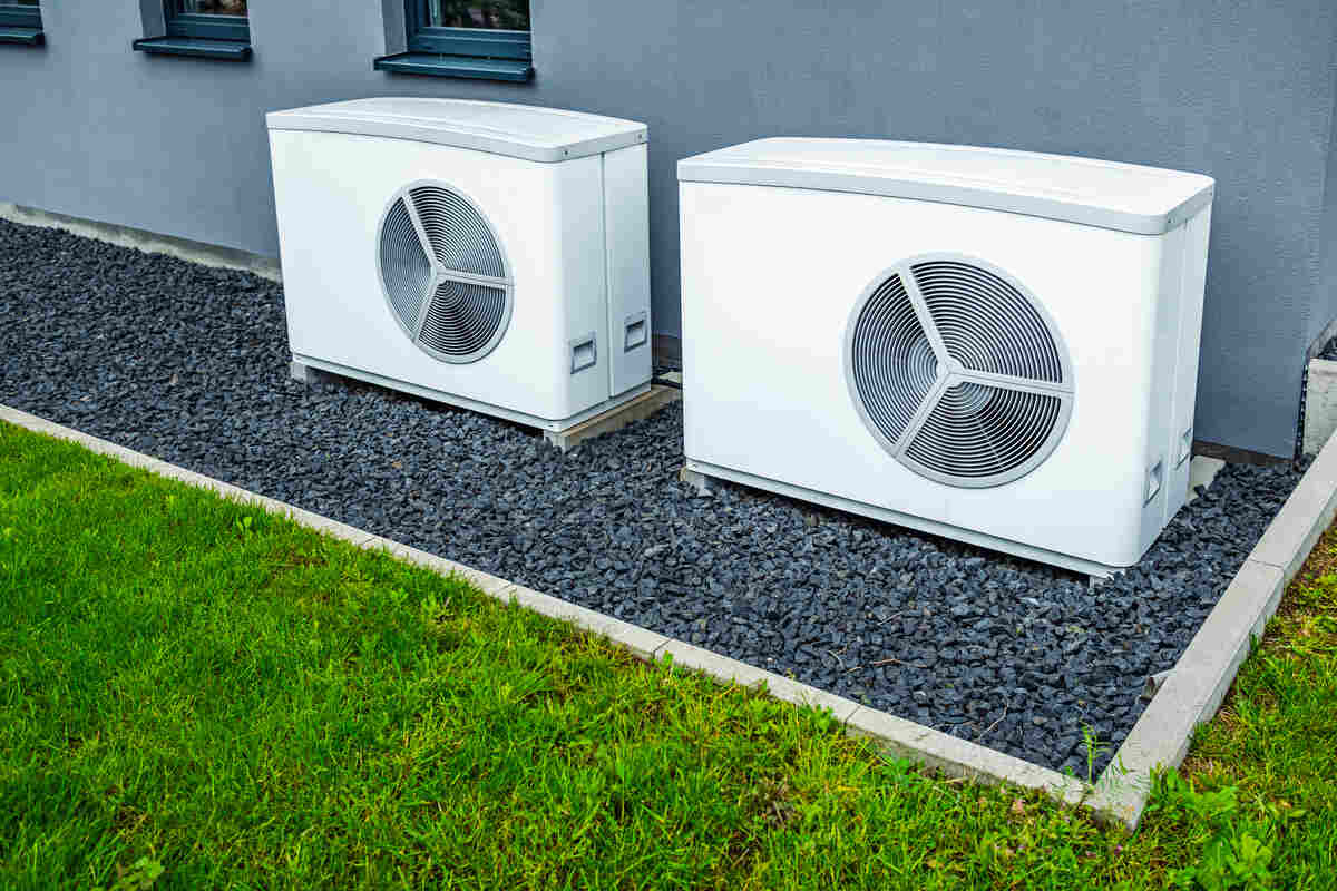 Modern outdoor air source heat pumps outside a building