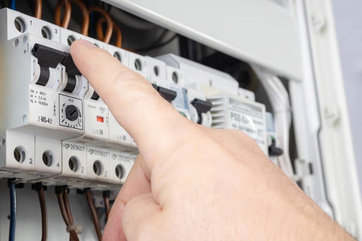 Hand adjusting circuit breakers in an electrical panel