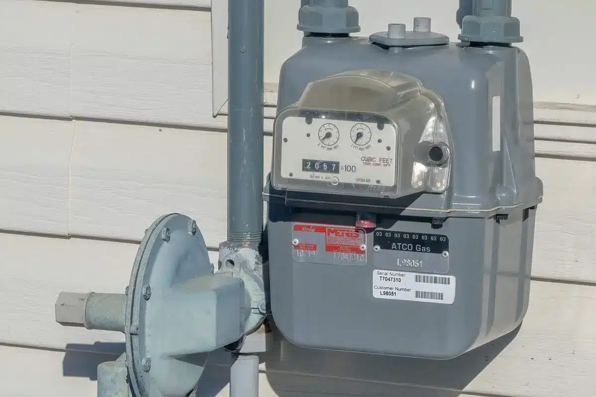 Natural gas meter on exterior wall of a home