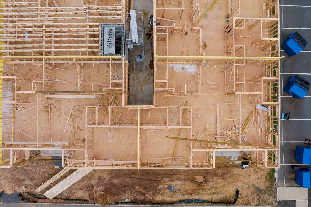 Aerial view of wooden framing of a house under construction