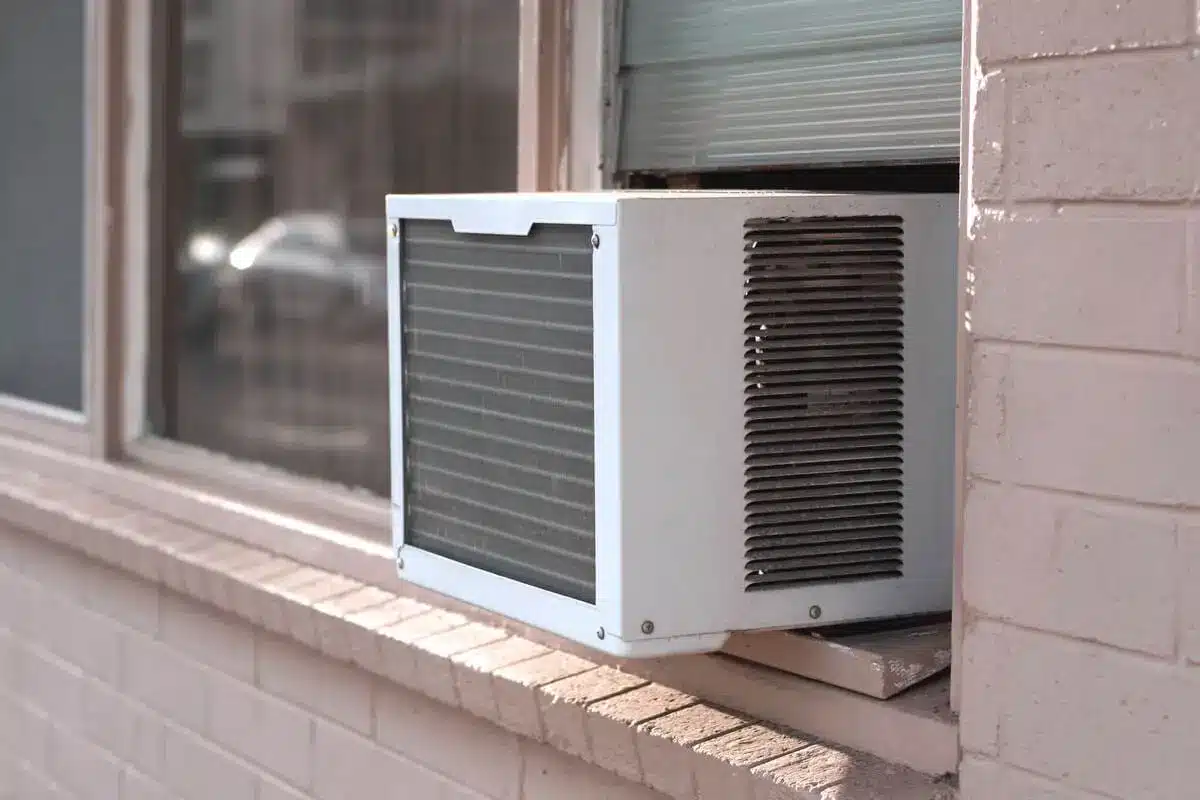 Window air conditioner unit installed in apartment window